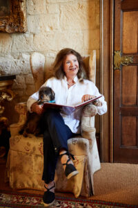 Lady Ashcombe and dog sitting Sudeley
