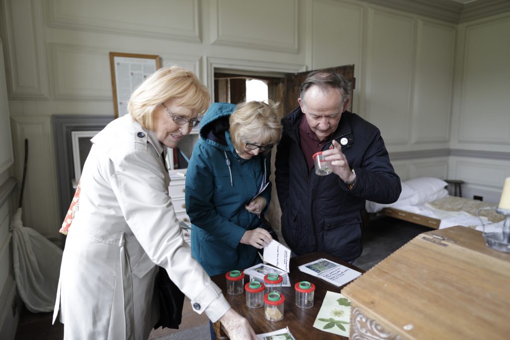 Visitors looking close up Middleton Hall